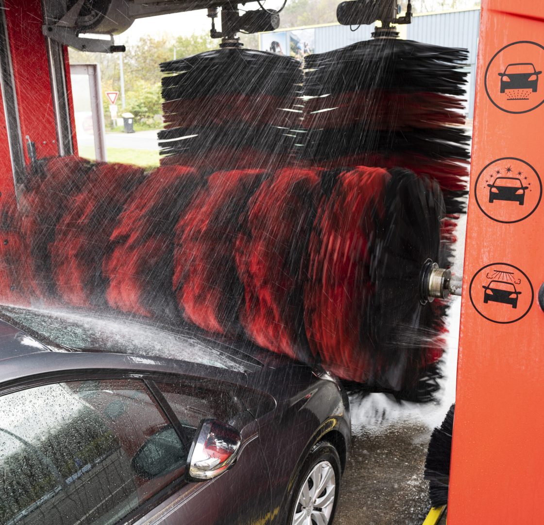 detail view on car wash, car wash foam water, Automatic car wash in action